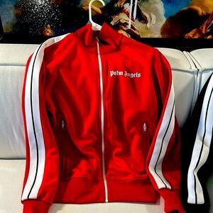 Green and red Palm Angels track jackets as a set. Fits small or kids 14/16